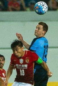 Zheng Zhi (left) of China’s Guangzhou Evergrande fights for the ball with Brandon Oneill of Sydney FC during their AFC Champions League group stage football match in Guangzhou, in China’s Guangdong province on Tuesday. AFP PHOTO