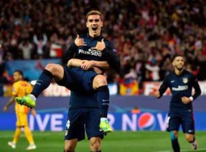 Atletico Madrid’s French forward Antoine Griezmann celebrates a goal during the Champions League quarterfinals second leg football match Club Atletico de Madrid VS FC Barcelona at the Vicente Calderon stadium in Madrid on April 13. AFP PHOTO