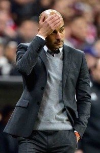 Bayern Munich’s Spanish head coach Pep Guardiola reacts during the UEFA Champions League semifinals, second-leg football match between FC Bayern Munich and Atletico Madrid in Munich, southern Germany, on Wednesday. AFP PHOTO