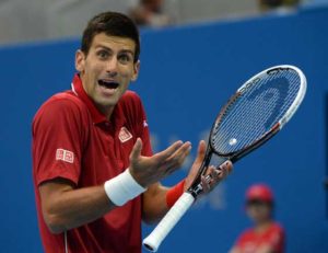 Serbia’s Novak Djokovic reacts during his men’s third round match against Britain’s Aljaz Bedene at the Roland Garros 2016 French Tennis Open in Paris on May 28.   AFP PHOTO 