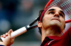 Switzerland’s Roger Federer serves to Germany’s Alexander Zverev during the ATP Tennis Open tournament at the Foro Italico, on Thursday in Rome. AFP PHOTO