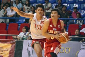 San Beda College sophomore guard AC Soberano (right) challenges the defense of University of the East’s Wilson Bartolome in the FilOil Flying V Pre-season Premier Cup at the San Juan Arena on Thursday. Photo by  Jaelle Nevin Reyes 