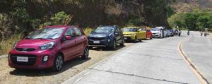 The convoy of KIA vehicles traveling from Bacolod to Dumaguete.