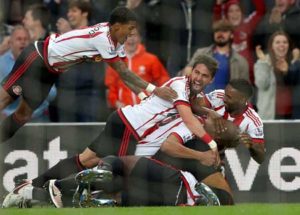 Sunderland players celebrate the goal of Sunderland’s French-born Ivorian defender Lamine Kone (below) during the English Premier League football match between Sunderland and Everton at the Stadium of Light in Sunderland, north east England on Thursday. AFP PHOTO