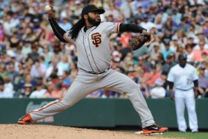 Starting pitcher Johnny Cueto No.47 of the San Francisco Giants delivers the ball against the Colorado Rockies at Coors Field on Tuesday in Denver, Colorado. AFP PHOTO