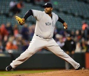 Starting pitcher CC Sabathia No.52 of the New York Yankees throws a pitch to a Baltimore Orioles batter in the first inning during a baseball game at Oriole Park at Camden Yards on Thursday in Baltimore, Maryland. AFP PHOTO 