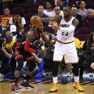 LeBron James No.23 of the Cleveland Cavaliers handles the ball in the third quarter against DeMarre Carroll No.5 of the Toronto Raptors in game one of the Eastern Conference Finals during the 2016 NBA Playoffs at Quicken Loans Arena on Wednesday in Cleveland, Ohio. AFP PHOTO