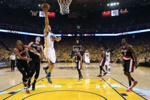 Klay Thompson No.11 of the Golden State Warriors goes up for a shot against the Portland Trail Blazers during Game 1 of the Western Conference Semifinals for the 2016 NBA Playoffs at ORACLE Arena on Monday in Oakland, California. AFP PHOTO