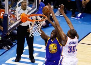 Draymond Green No.23 of the Golden State Warriors shoots against Kevin Durant No.35 of the Oklahoma City Thunder in Game 3 of the Western Conference finals during the 2016 NBA Playoffs at Chesapeake Energy Arena on Monday in Oklahoma City, Oklahoma. AFP PHOTO