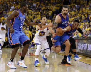 Stephen Curry No.30 of the Golden State Warriors reaches for a loose ball against Dion Waiters No.3, Steven Adams No.12 and Russell Westbrook No.0 of the Oklahoma City Thunder during Game 5 of the Western Conference finals during the 2016 NBA Playoffs at ORACLE Arena on Friday in Oakland, California. AFP PHOTO