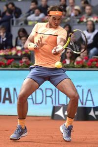 Spanish tennis player Rafael Nadal returns a ball to Portuguese tennis player Joao Sousa during the Madrid Open tournament at the Caja Magica (Magic Box) sports complex in Madrid on Saturday. AFP PHOTO