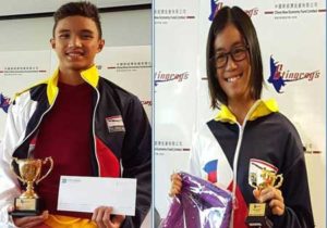 Sean Terence Zamora (left) winner of Top Male Swimmer award and Kyla Soguilon winner of MOS plum. CONTRIBUTED PHOTO