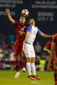 Rodrigo Ramallo No.18 of Bolivia collides with Christian Pulisic No.17 of USA late in the second half of the COPA America Centenario USA 2016 on Sunday at Children’s Mercy Park in Kansas City, Kansas. AFP PHOTO