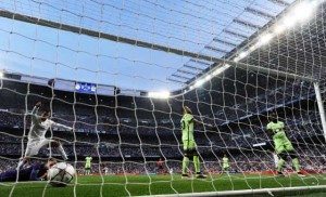 Real Madrid’s Portuguese forward Cristiano Ronaldo (left top) looks at the ball after Real Madrid’s Welsh forward Gareth Bale’s goal during the UEFA Champions League semi-final second leg football match Real Madrid CF vs Manchester City FC at the Santiago Bernabeu stadium in Madrid, on Thursday. AFP PHOTO