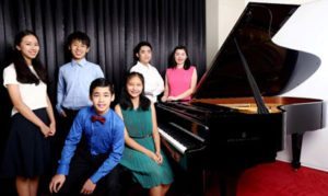 The finalists of the 3rd Philippine Steinway Youth Piano Competition: (Standing, from left) Irene Lee, Jet Chong, Carlos Cornelio and Moriah Ongchoco ; and (Seated, from left) Hansel Ang and Andrea Versoza 