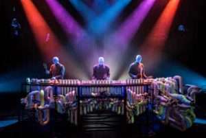 With an ambiguity, the Blue Man Group uses loud music, funny acts, and even everyday things as tools for communication