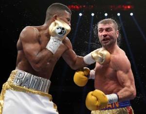 Lucian Bute of Canada (right) is punched by Badou Jack of Sweden in their WBC super middleweight championship bout at the DC Armory in Washington, DC. AFP PHOTO