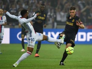 Lyon’s French forward Alexandre Lacazette (left) vies with Monaco’s French midfielder Jeremy Toulalan (right) during the French L1 football match Olympique Lyonnais and AS Monaco at the New Stadium in Decines-Charpieu near Lyon, southeastern France. AFP PHOTO