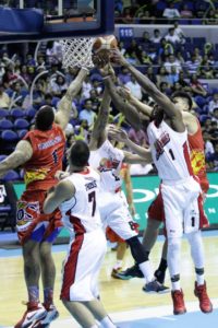 One for all, all for one! Alaska’s Rob Dozier, Calvin Abueva and Sonny Thoss battle for the rebound against Rain or Shine’s Pierre Henderson-Niles and Jewel Ponferada during Game 2 of the Philippine Basketball Association finals at the Araneta Coliseum.  CZAR DANCEL 