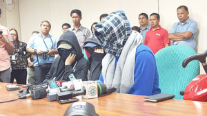 WHISTLEBLOWERS Three men appear at a Senate news conference claiming to have taken part in vote-shaving and vote-padding operations in Quezon province. PHOTO BY JEFFERSON ANTIPORDA 