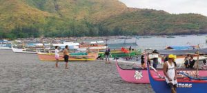 Boats going to Anawangin Cove waiting for passengers. The Almeras parked at the Tree Top at the beach.