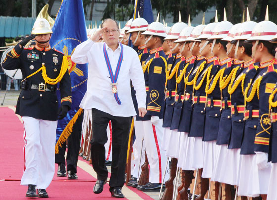 FAREWELL President Benigno Aquino 3rd troops the line for the last time in a ceremony held in his honor at Camp Crame, headquarters of the Philippine National Police. PHOTO BY RUY L. MARTINEZ 