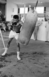 An October 27, 1974 photo shows former world heavyweight champion Muhammad Ali during a training session in Kinshasa, Zaire, before his world heavyweight championship fight against titleholder US George Foreman on October 30, 1974. Ali won by knocking out Foreman in the eighth round.  AFP PHOTO 