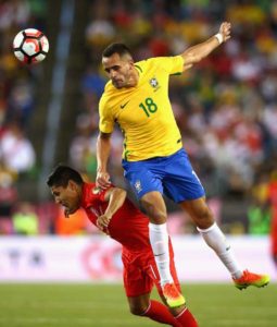 Renato Augusto No.18 of Brazil heads the ball against Raul Ruidiaz No.11 of Peru in the second half during a 2016 Copa America Centenario Group B match at Gillette Stadium on Monday in Foxboro, Massachusetts.  AFP PHOTO