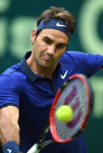 Roger Federer from Switzerland in action against Jan-Lennard Struff from Germany during the ATP Tournament in Halle, on Thursday. AFP PHOTO