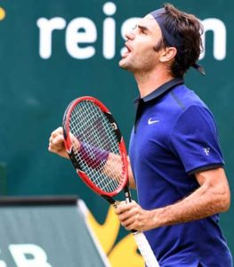 Roger Federer from Switzerland reacts after he won a quarterfinals against David Goffin from Belgium in the ATP tennis tournament in Halle, western Germany, on Saturday. AFP PHOTO