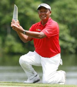 Tony Lascuna hoists his trophy after scoring another victory at ICTSI Eagle Ridge Invitational. CONTRIBUTED PHOTO