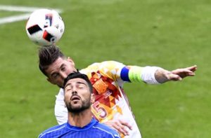 Spain’s defender Sergio Ramos (left) vies with Italy’s midfielder Alessandro Florenzi during Euro 2016 round of 16 football match between Italy and Spain at the Stade de France stadium in Saint-Denis, near Paris, on Tuesday.   AFP PHOTO