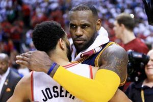 LeBron James No.23 of the Cleveland Cavaliers embraces Cory Joseph No.6 of the Toronto Raptors after the Cleveland Cavaliers defeated the Toronto Raptors 113 to 87 in game six of the Eastern Conference finals during the 2016 NBA Playoffs at Air Canada Center on May 27, in Toronto, Canada.  AFP PHOTO