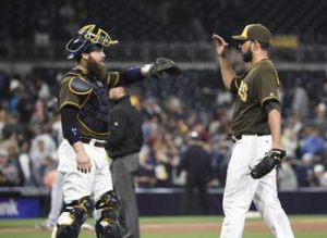 Carlos Villanueva No.23 of the San Diego Padres, right, is congratulated by Derek Norris No. 3 after the Padres beat the Colorado Rockies 4-0 in a baseball game at PETCO Park on Saturday in San Diego, California.  AFP PHOTO