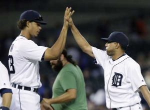 Steven Moya No.33 of the Detroit Tigers celebrates with pitcher Francisco Rodriguez No.57 of the Detroit Tigers after a 5-1 win over the Seattle Mariners at Comerica Park on Thursday in Detroit, Michigan. AFP PHOTO