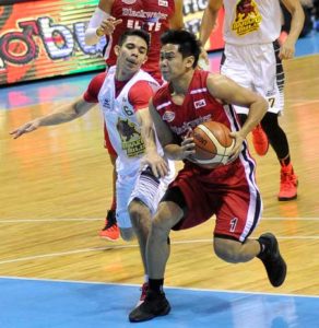 Jerich Canada of Blackwater Elite drives on Emman Monfort of Barako Bull during a PBA game at the Smart Araneta Coliseum in Quezon City. FILE PHOTO