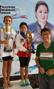 Philippine Swimming League President Susan Papa awards the FemaleMost Improved Swimmer to Heather White (left) and the Male PromisingSwimmer to Marc Bryan Dula on Saturday at the Diliman College inQuezon City. CONTRIBUTED PHOTO