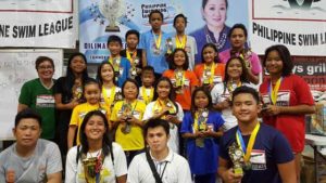 Philippine Swimming League (PSL) President Susan Papa with the Most Outstanding Swimmer awardees in the Motivational Division of the 96th PSL National Series held at the Diliman College swimming pool in Quezon City.  CONTRIBUTED PHOTO