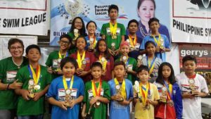 n The Most Outstanding Swimmer awardees in the Novice Division of the 96th Philippine Swimming League (PSL) National Series Novice and Motivational Meet pose with PSL President Susan Papa.  CONTRIBUTED PHOTO