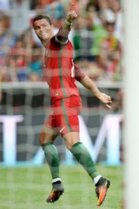 Portugal’s forward Cristiano Ronaldo celebrates after scored against Estonia during the friendly football match Portugal vs Estonia at Luz stadium in Lisbon on June 8, in preparation for the upcoming UEFA Euro 2016 Championship. AFP PHOTO