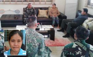 FREE AT LAST Hostage Maritess Flor, held captive for more than 9 months, talks to military and government officials after being freed by the Abu Sayyaf Group on Friday. afp photo