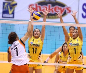 Team Iriga’s top hitter Grezelle Bombita rams in a kill against Baguio’s Anna Rossi (11) and Aloise Costales during their Shakey’s V-League encounter on Monday. CONTRIBUTED PHOTO