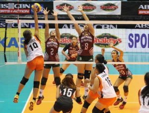 Shola Alvarez (19) of Iriga challenges UP’s blockers Mae Basarte (2) and Katherine Bersola (8) during their Shakey’s V-League encounter. CONTRIBUTED PHOTO