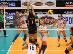 BaliPure’s Amy Ahomiro (left) beats Team Iriga’s Grazielle Bombita in a one-on-one duel upfront, scoring on a kill during their Shakey’s V-League clash on Wednesday.  CONTRIBUTED PHOTO