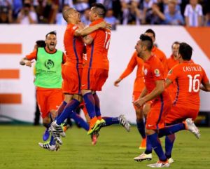 Francisco Silva (No. 5) and Gary Medel (No. 17) of Chile celebrate the win over Argentina during the Copa America Centenario Championship match at MetLife Stadium in East Rutherford, New Jersey. AFP PHOTO