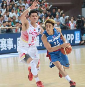 Gilas Pilipinas’ Terrence Romeo drives against a Chinese player. PHOTO FROM GILAS PILIPINAS OFFICIAL FACEBOOK