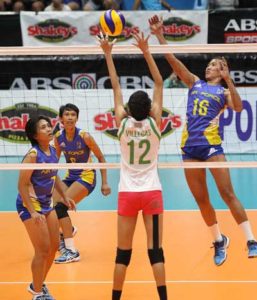 Air Force’s Angel Antipuesto (16) cashes in on Laoag’s single blocker in Katherine Villegas for a hit during Game One of their best-of-three semifinal series in the Shakey’s V-League. CONTRIBUTED PHOTO