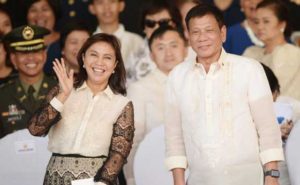 ‘Cordial Meeting’ A beaming Vice President Maria Leonor ‘Leni’ Robredo waves to the crowd as she is photographed with President Rodrigo Duterte. For the first time since winning the May 9 polls, the two met during turnover ceremonies for new Armed Forces chief Lt. Gen. Ricardo Visaya at Camp Aguinaldo in Quezon City. AFP Photo