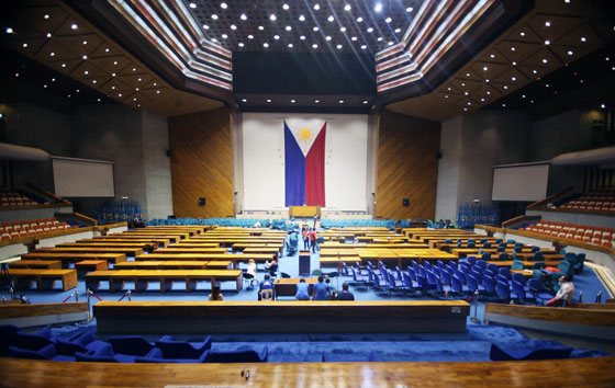 Workers at the House of Representatives clean up the session hall for the first State of the Nation Address of President Rodrigo Duterte on July 25. PHOTO BY MIKE DE JUAN 