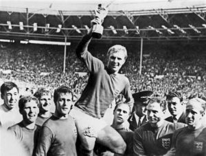 England’s national soccer team captain Bobby Moore holding aloft the Jules Rimet trophy as he is carried by his teammates following England’s victory over Germany (4-2 in extra time) in the World Cup finals on July 30, 1966 at Wembley stadium in London. AFP FILE PHOTO